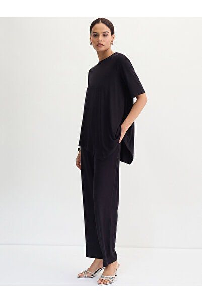 Femmella By Styli Black Asymmetrical Knit Top And Pants Co-Ords