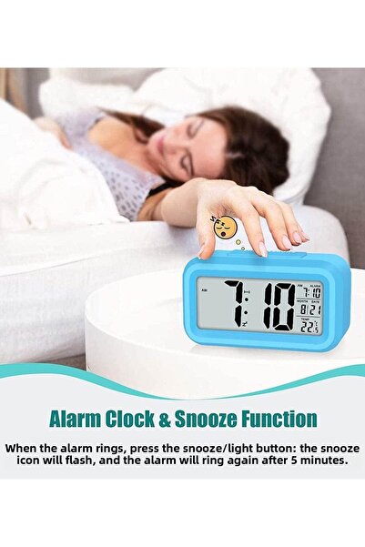 Generic Electronic digital LED alarm clock, showing temperature and calendar, blue