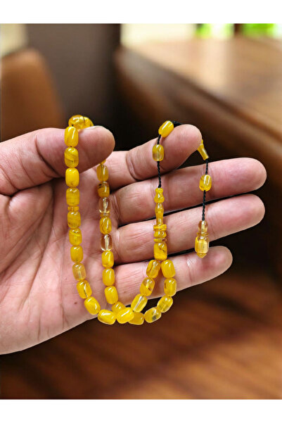 İnan Tesbih سبحة موديل هاراكيتا رينج كولور، مصنوعة من العقيق الأصفر المضغوط، بتصميم موديل هاراكيتا، بطول يصل إلى المعصم، بنظام موديل هاراكيتا.