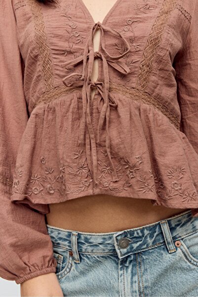 Stradivarius Loose-fitting embroidered knot blouse