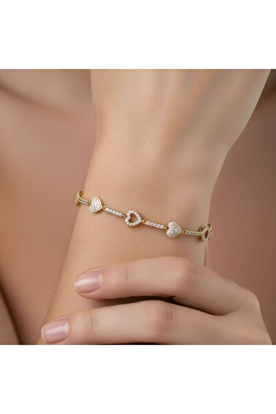 Snartun سوار نسائي من Xuping بلون ذهبي مع حجر الزركون وتفاصيل سلسلة، أنيق وراقٍ، يأتي في علبة خاصة