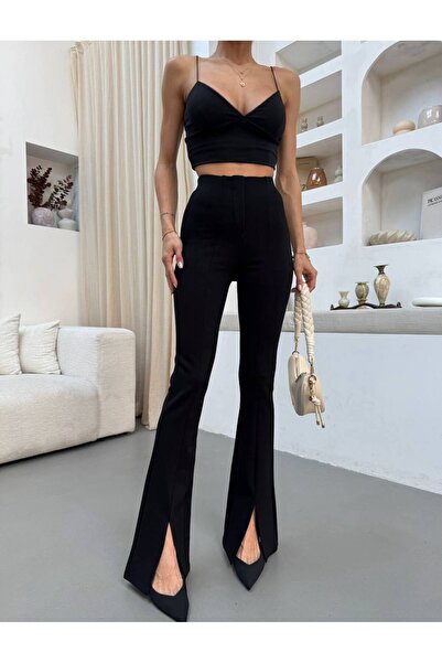 BUSEM Siyah önü yırtmaçlı ispanyol paça kadın pantolon