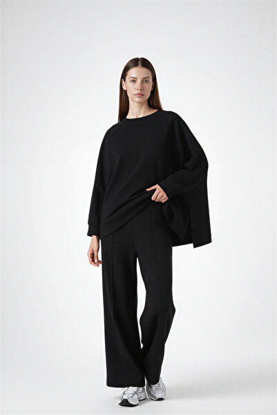 Amia&Co. Μαύρο βασικό παντελόνι με λεπτομέρεια από λάστιχο στη μέση