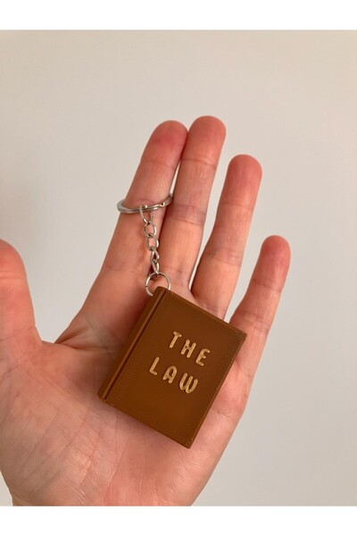 genomera سلسلة مفاتيح على شكل كتاب قانون صغير