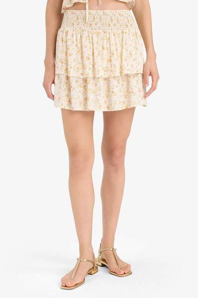 DeFacto Μίνι φούστα Coool σε γραμμή Α με λουλουδάτο σχέδιο και κρυμμένη μέση από βισκόζη F5130AX25SM