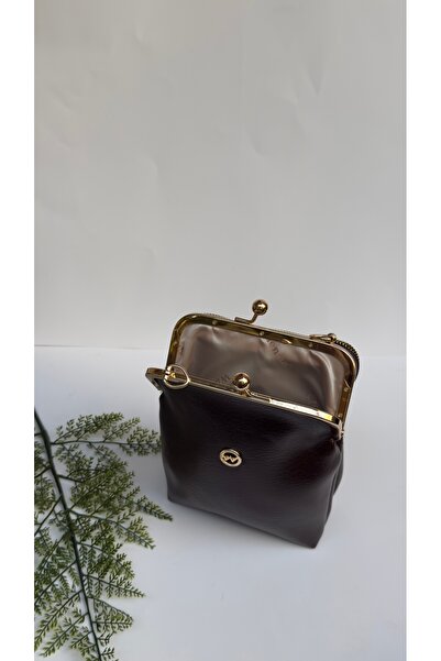 EG-BAGSS حقيبة كروس نسائية بثلاثة عيون