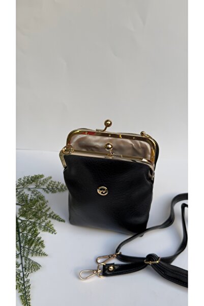 EG-BAGSS حقيبة كروس نسائية بثلاثة عيون