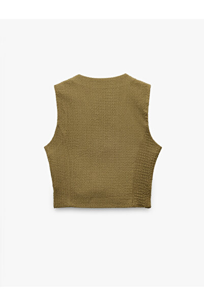 Koton Αμάνικο γιλέκο με λαιμόκοψη σε σχήμα V με κουμπιά και τσέπες φλετό