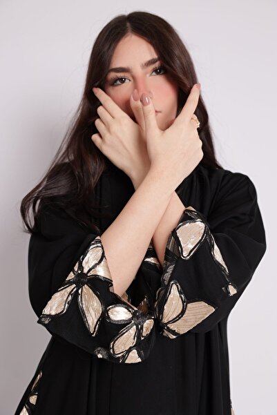 Threadline Black abaya with side embroidery and shiny floral sleeve edges in gold and beige