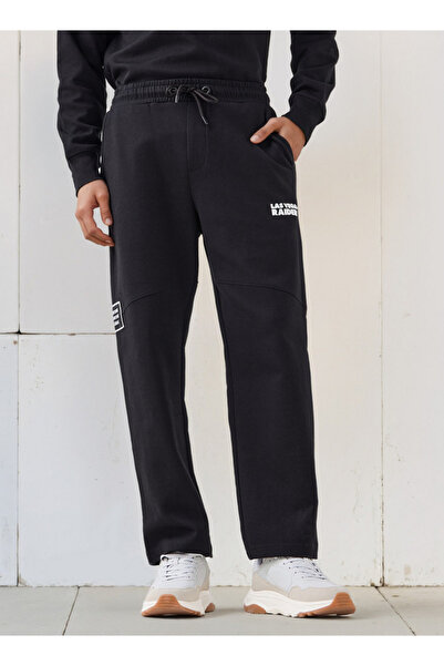 SP Characters بنطال رياضي رجالي قصة مريحة بخصر مرن مع طباعة NFL