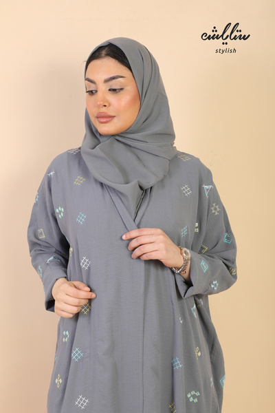 Stylish Crepe wrap abaya in gray with embroidery all over the abaya