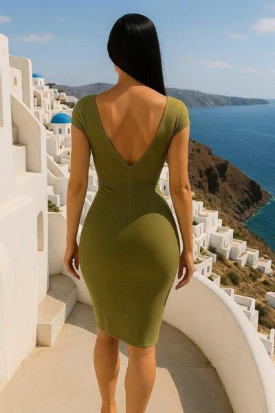 Modafeminen A Glamorous Invitation Dress That Combines a Classic Cut with Bold and Dynamic Ruffle Details 58256