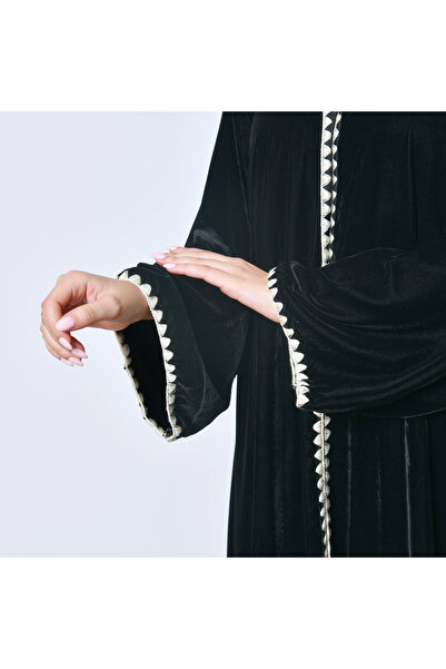 HAWRAA ABAYA Black velvet winter abaya with pearl trim – soft luxury from Houra Abayas
