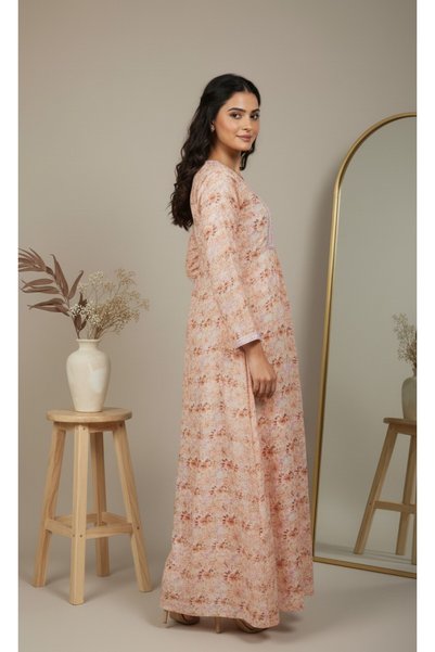 Maison Emarat White floral jalabiya with embroidery on the yoke—light, breezy, and perfect for everyday wear.