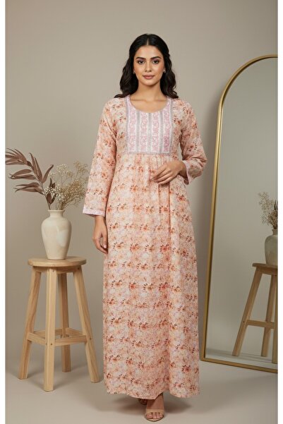 Maison Emarat White floral jalabiya with embroidery on the yoke—light, breezy, and perfect for everyday wear.