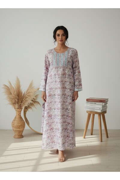 Maison Emarat White floral jalabiya with embroidery on the yoke—light, breezy, and perfect for everyday wear.