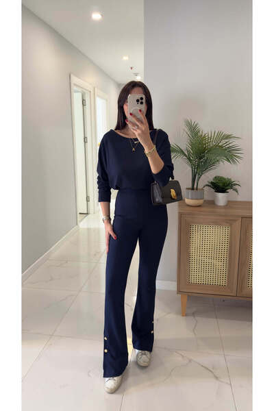 BİRCANÇİL ليراسا - بنطلون ضيق بتفاصيل أزرار باللون الأزرق الداكن