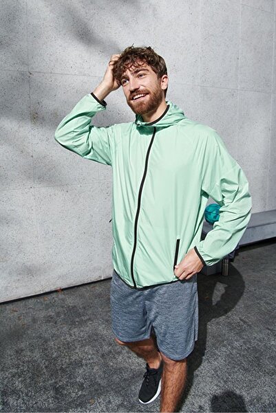 Tchibo جاكيت رياضي رجالي بأكمام طويلة للجري، لون أخضر نعناعي