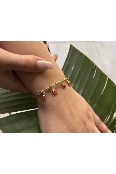 Luz De Viento Uğur Böceği Charmlı Gold Çelik Kadın Bileklik