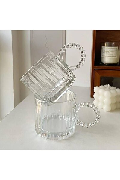 Generic A set of striped glass cups with glass bead handles. For hot and cold beverages.