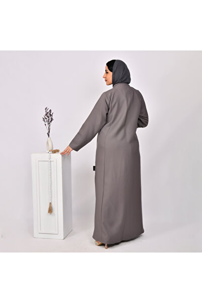 HAWRAA ABAYA A practical gray wrap abaya with detailed stitching.