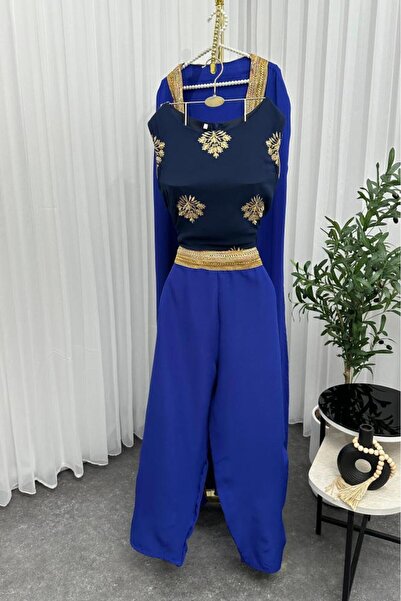 Barbie jumpsuit embellished with computer embroidery and gold trim