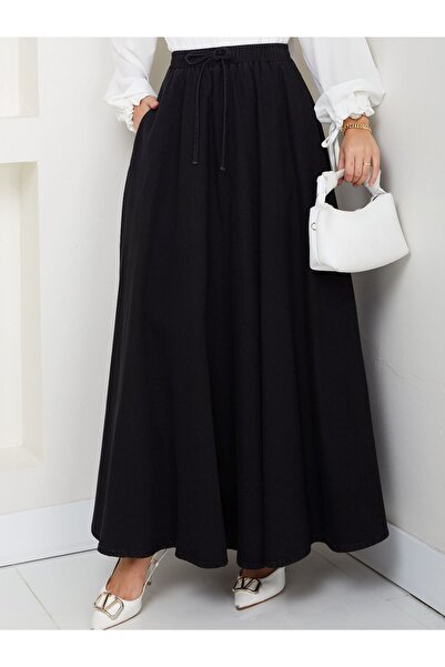 VELLICHOR Black jeans with elastic waist and flared skirt