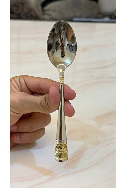 Palaces Silver and gold dinnerware sets including spoons, forks, and knives