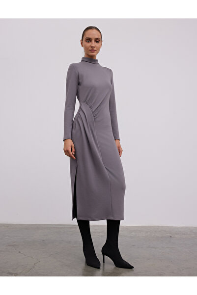 BGN workshop فستان طويل بتفاصيل ييرتماكلي وبيزوغوي