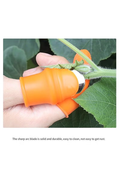 Generic Silicone prosthetic thumb with a small gardening knife, orange, 5 x 2 x 2 cm
