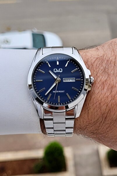 Q&Q Kadranı Lacivert Kordonu Metalik Renk 2 Yıl Garantili 40,5 mm Göstergeler...