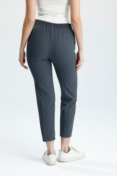 VOICTEC Plus Size Bell Fabric Pocket Carrot Pants with Elastic Waist