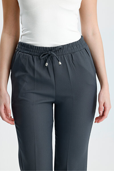 VOICTEC Plus Size Bell Fabric Pocket Carrot Pants with Elastic Waist