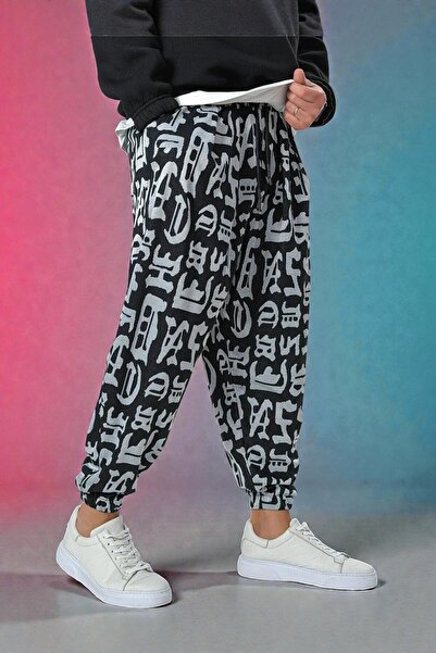 COCOPELLI Ανδρικό πλισέ μισό φαρδύ παντελόνι με μοτίβο γράφιτι και ελαστικές τσέπες στα πόδια, χαλαρό hippie bohemian φαρδύ παντελόνι