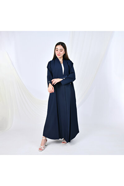 HAWRAA ABAYA عباية بلون الكحلي بتصميم انسيابي مميز مزينة بأزرار زينة على شكل ...