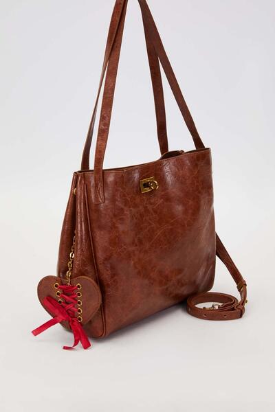 Levidor Dark brown knitted accessory detailed shoulder bag