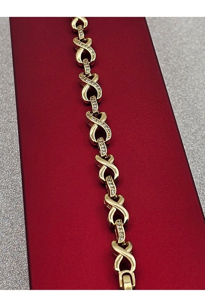 Mosso Steel سوار فولاذي ذهبي اللون من Xuping بتصميم إنفينيتي مع تفاصيل حجر ال...