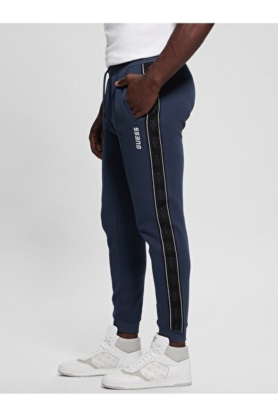 Guess بنطال رياضي بشعار جانبي باللون الأزرق الداكن للرجال