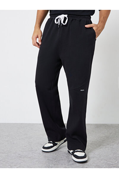 Styli Men Black Waffle Oversize Joggers