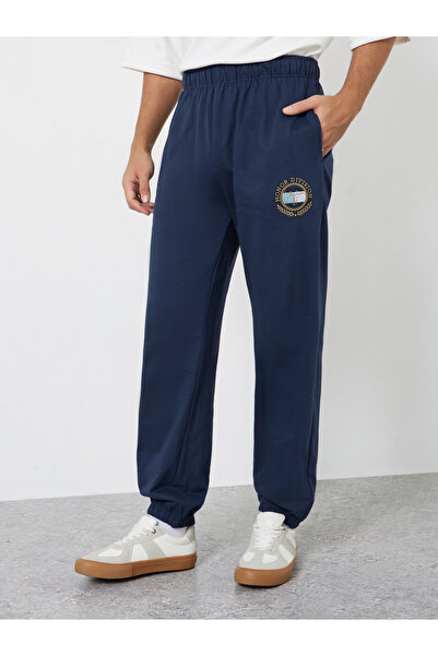 Styli Men Navy Blue Embroidered Terry Joggers