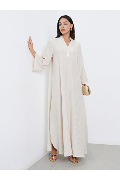 Styli جلابية منقوشة مع تفاصيل شراشيب