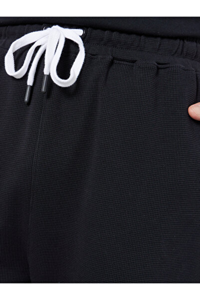 Styli Men Black Waffle Oversize Joggers