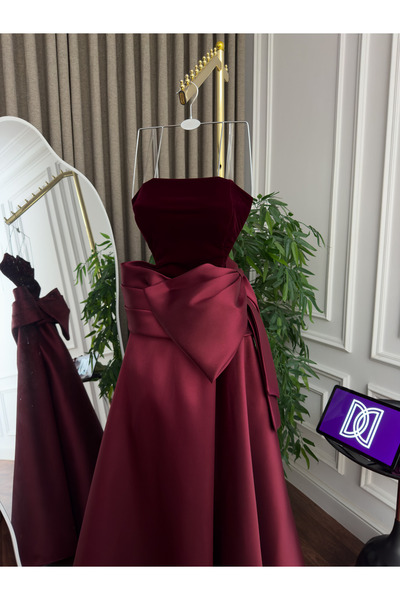 Generic Luxurious wool and Mikado evening gown - strapless design with a large bow - a regal look in a sophisticated burgundy color