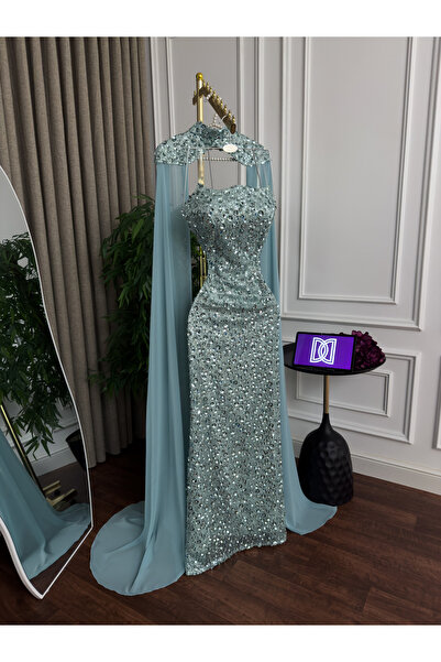 Generic Luxurious evening gown with full beadwork - embroidered trim with a flowing chiffon cape - in a captivating Tiffany blue