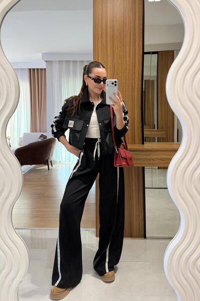 Gizem Ecemiş بنطلون هولدن ذو الحواف السوداء المكتوب عليها