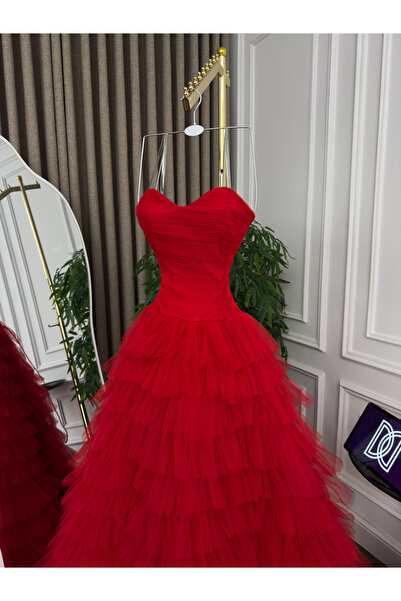 Generic Multi-layered tulle evening dress - flared skirt with a long train - bold strapless design in fiery red