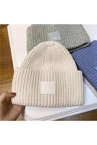 NO BRAND AC hat with a smiling face, wool hat with a square label, rolled up ...