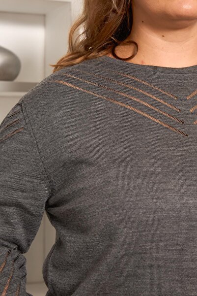 RMG Plus size knitwear with large sleeve and neck pattern