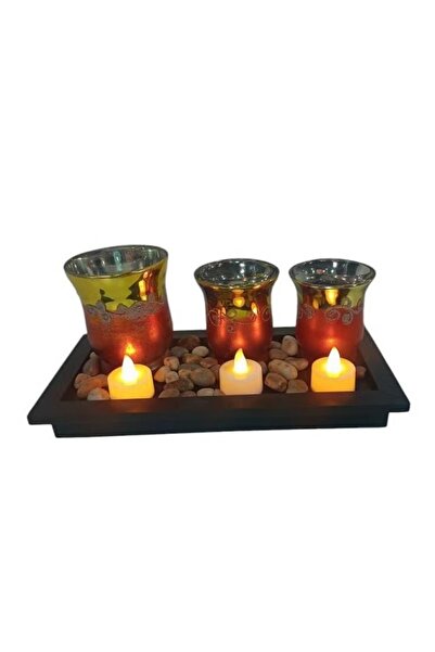 Generic A set of elegant decorative candles that adds a warm and luxurious touch to any space. It consists of three candle holders.