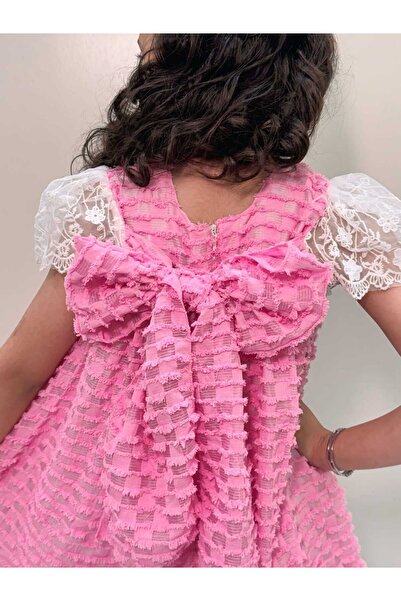 Generic Girls' dress with ruffled details in cascading layers